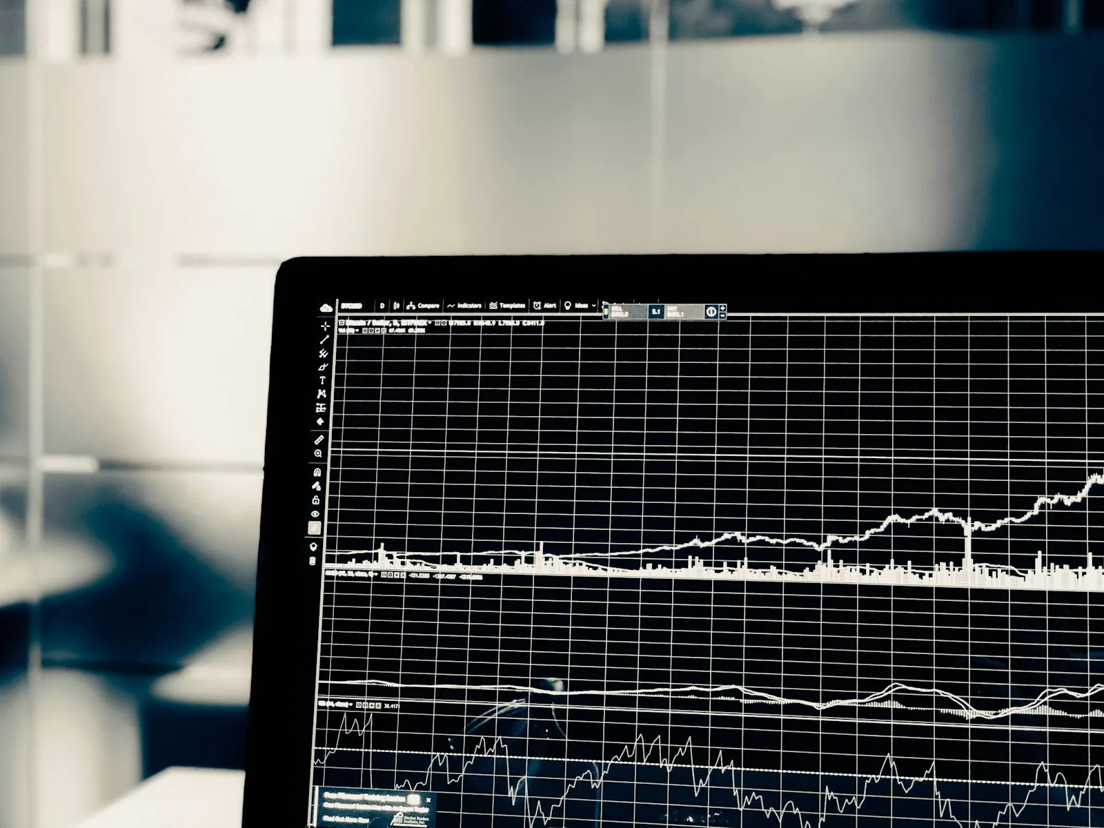 Close-up of a laptop screen showing a financial performance chart