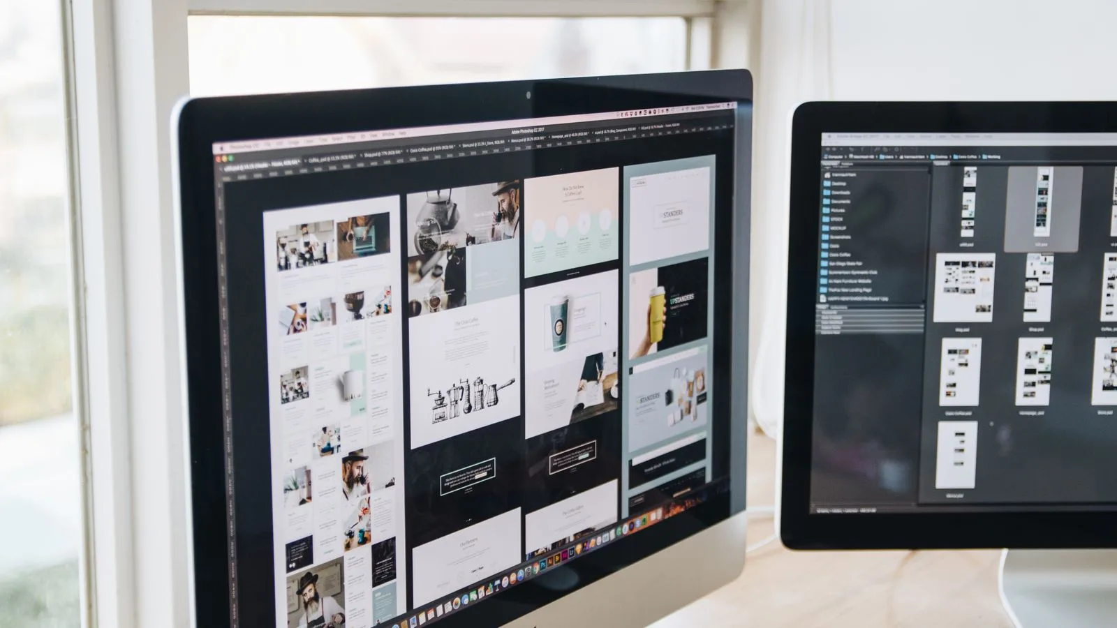 Modern office desk setup with dual monitors displaying design software, ideal for tech and business themes.